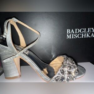 Brand new, in box Badgley Mischka formal sandal. Silver. Rhinestones